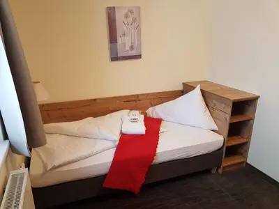 Ein Bett oder Betten in einem Zimmer der Unterkunft Hotel Pariente
