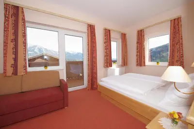 Ein Bett oder Betten in einem Zimmer der Unterkunft Hotel Pariente