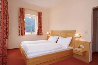 Ein Bett oder Betten in einem Zimmer der Unterkunft Hotel Pariente