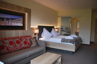 Ein Bett oder Betten in einem Zimmer der Unterkunft Hotel Pariente