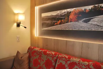 Ein Sitzbereich in der Unterkunft Hotel Pariente