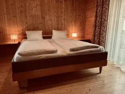 Ein Bett oder Betten in einem Zimmer der Unterkunft Villa Florl