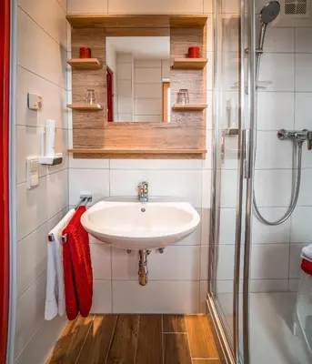 Ein Badezimmer in der Unterkunft Appartementhaus Speckalm