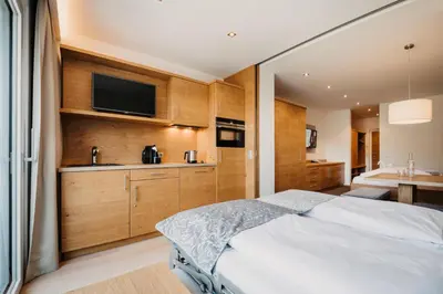 Ein Bett oder Betten in einem Zimmer der Unterkunft Alpina Wagrain