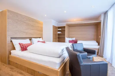 Ein Bett oder Betten in einem Zimmer der Unterkunft Appartements Luna