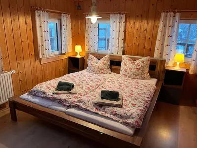Ein Bett oder Betten in einem Zimmer der Unterkunft Ferienwohnung Bauernhaus Untermoas