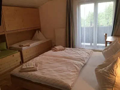 Ein Bett oder Betten in einem Zimmer der Unterkunft Gasthof Tennenblick