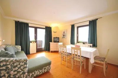 Ein Sitzbereich in der Unterkunft Apparthotel Restaurant Steiners