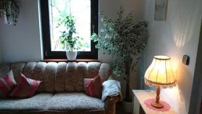 Ein Sitzbereich in der Unterkunft Haus Ruf