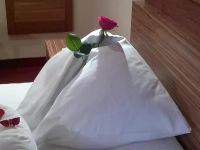 Ein Bett oder Betten in einem Zimmer der Unterkunft Scheffer's Hotel