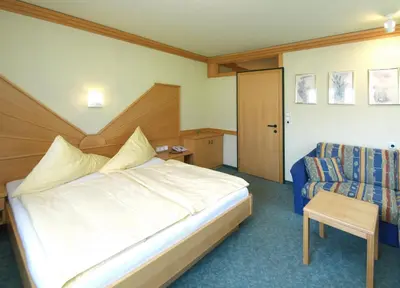 Ein Bett oder Betten in einem Zimmer der Unterkunft Salzburger Stubn