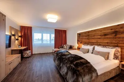 Ein Bett oder Betten in einem Zimmer der Unterkunft Hotel Zehnerkar & Hotel Obertauern