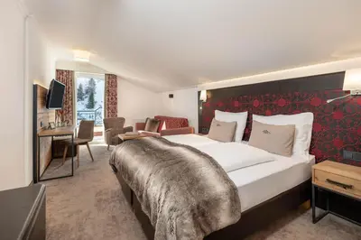 Ein Bett oder Betten in einem Zimmer der Unterkunft Hotel Zehnerkar & Hotel Obertauern