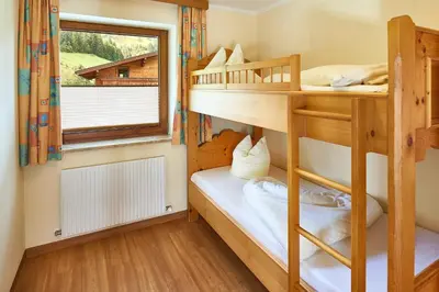 Ein Bett oder Betten in einem Zimmer der Unterkunft Sonnberg Ferienanlage