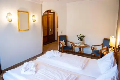 Ein Bett oder Betten in einem Zimmer der Unterkunft Sporthotel Radstadt