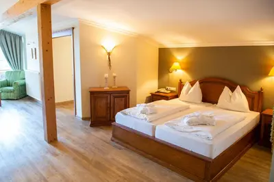 Ein Bett oder Betten in einem Zimmer der Unterkunft Sporthotel Radstadt