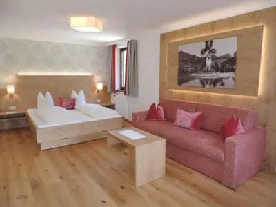 Ein Bett oder Betten in einem Zimmer der Unterkunft Landhotel Hochlackenhof