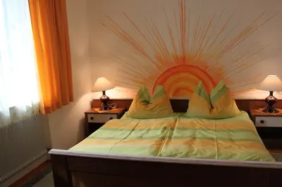 Ein Bett oder Betten in einem Zimmer der Unterkunft Ferienwohnung Winklhofer