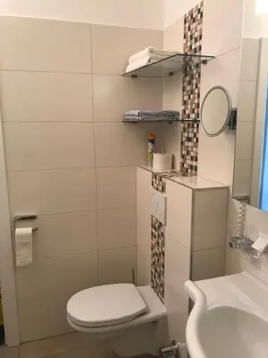 Ein Badezimmer in der Unterkunft Apartment.Kirche