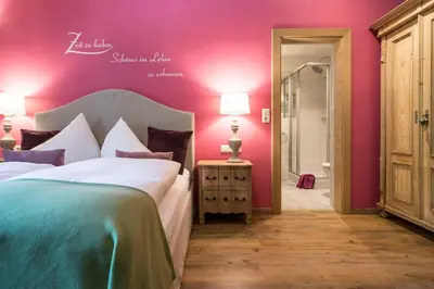 Ein Bett oder Betten in einem Zimmer der Unterkunft Waldruhe - Bett, Frühstück & ein Lächeln