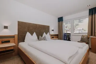 Ein Bett oder Betten in einem Zimmer der Unterkunft B&B Hotel Die Bergquelle