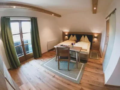 Ein Bett oder Betten in einem Zimmer der Unterkunft Appartements Macheiner