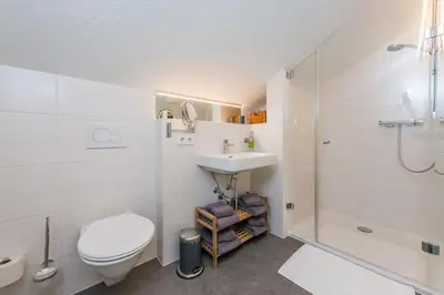 Ein Badezimmer in der Unterkunft Apartments Frechhof