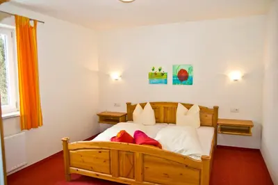 Ein Bett oder Betten in einem Zimmer der Unterkunft Appartmentanlage Isegrim