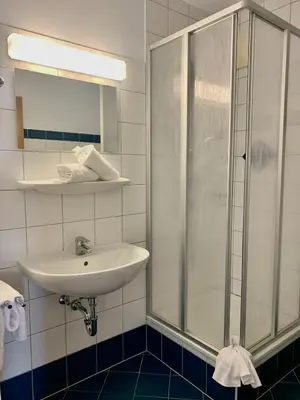 Ein Badezimmer in der Unterkunft Appartmentanlage Isegrim