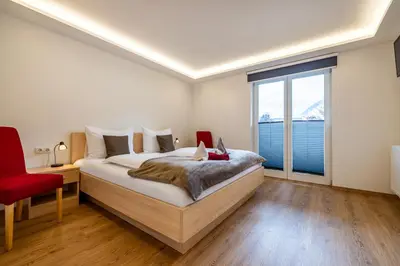 Ein Bett oder Betten in einem Zimmer der Unterkunft Haus Roswitha