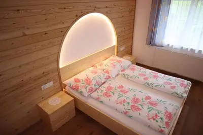 Ein Bett oder Betten in einem Zimmer der Unterkunft Tremlhof