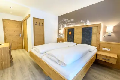 Ein Bett oder Betten in einem Zimmer der Unterkunft Hotel & Gasthof Taferne
