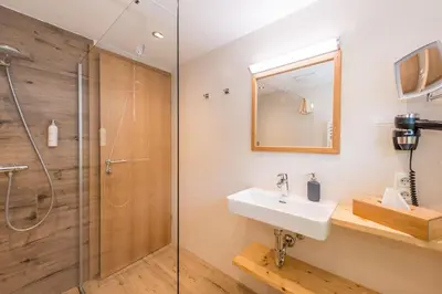 Ein Badezimmer in der Unterkunft Das kleine Bio Hotel Tiefenbach