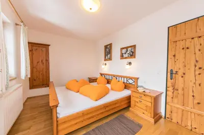 Ein Bett oder Betten in einem Zimmer der Unterkunft Ferienhof Leitengut