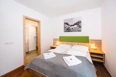 Ein Bett oder Betten in einem Zimmer der Unterkunft Apart Jasmin