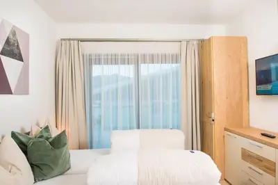 Ein Bett oder Betten in einem Zimmer der Unterkunft Villa Valentine
