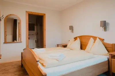 Ein Bett oder Betten in einem Zimmer der Unterkunft Kugellehen