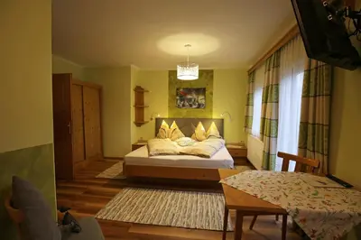 Ein Bett oder Betten in einem Zimmer der Unterkunft Haufhof-Pension am Bauernhof, Haus im Ennstal bei Schladming