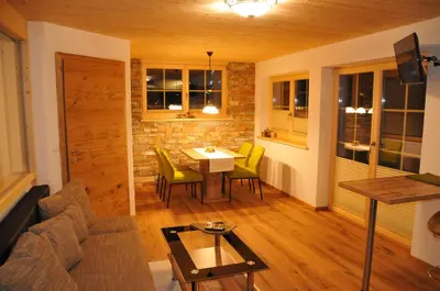 Ein Sitzbereich in der Unterkunft Romantikappartement Petz****