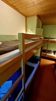 Ein Etagenbett oder Etagenbetten in einem Zimmer der Unterkunft Dachsteinblick