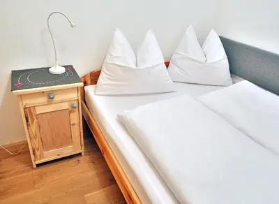 Ein Bett oder Betten in einem Zimmer der Unterkunft Appartement Haus Tanja