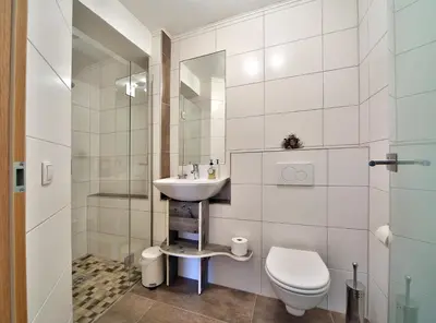 Ein Badezimmer in der Unterkunft Appartement Haus Tanja