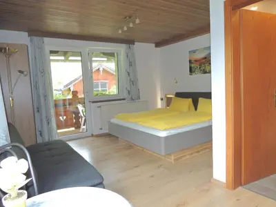 Ein Bett oder Betten in einem Zimmer der Unterkunft Haus Bergfried