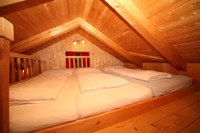 Ein Bett oder Betten in einem Zimmer der Unterkunft Ferienhaus Hutegger