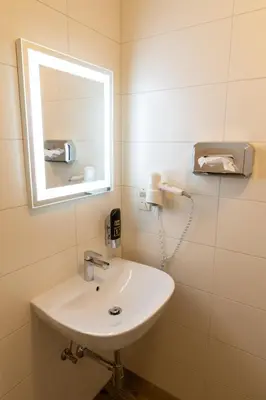 Ein Badezimmer in der Unterkunft Metzgerwirt Vieh Heli