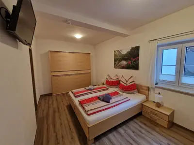 Ein Bett oder Betten in einem Zimmer der Unterkunft Brücklerhof