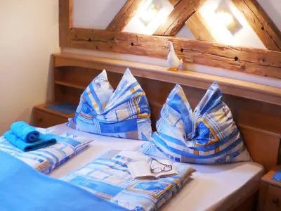 Ein Bett oder Betten in einem Zimmer der Unterkunft Landhaus Wiederkehr