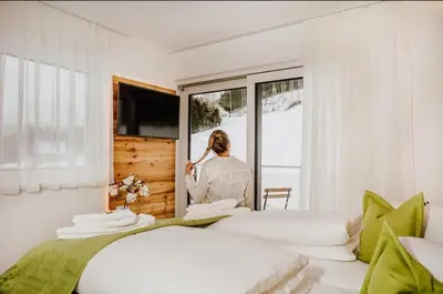 Ein Bett oder Betten in einem Zimmer der Unterkunft Appartements Almnest