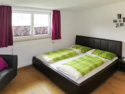 Ein Bett oder Betten in einem Zimmer der Unterkunft Apartment Lärche by Interhome
