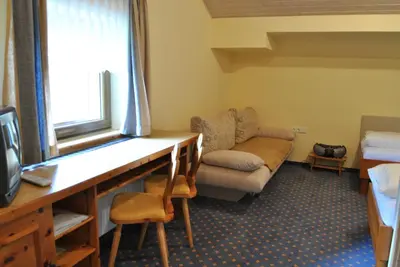 Ein Sitzbereich in der Unterkunft Gäste- und Seminarhaus Sölkstub'n